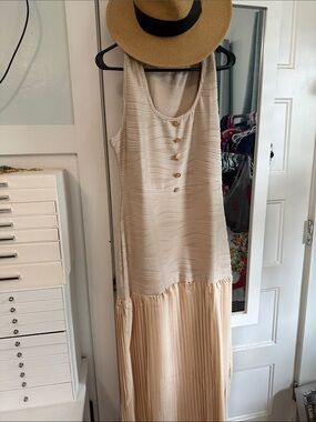 Sleeveless Cream Maxi Dress with Pleated Skirt and Button Front